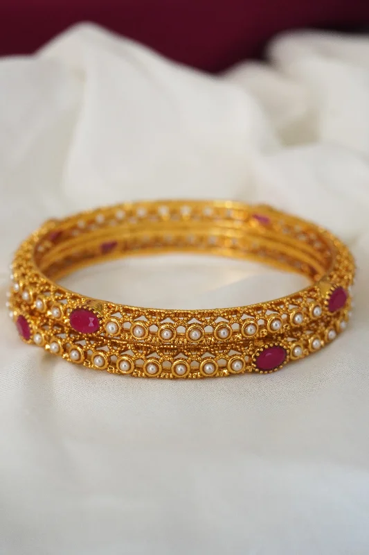 romantic bracelet for her-Ruby and Pearl Gold Plated Bangles